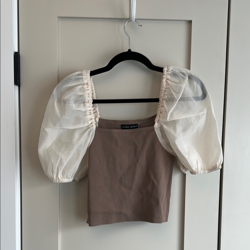 Elegant Brown and Cream Blouse with Chic Design